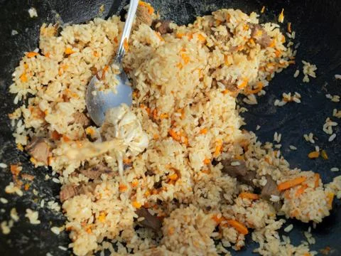 Spoon in pilaf 库存照片