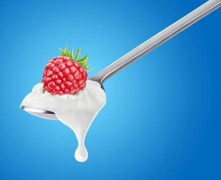 Spoon of raspberry yogurt Stock Photos