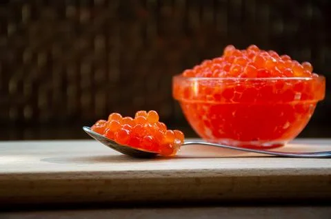 Spoon of red caviar for the festive table Stock Photos