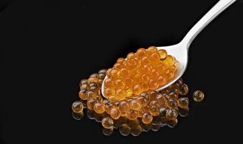 Spoon of red caviar, package design element Stock Photos
