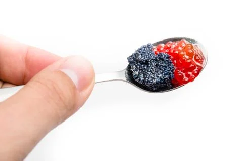 Spoon red caviar Stock Photos