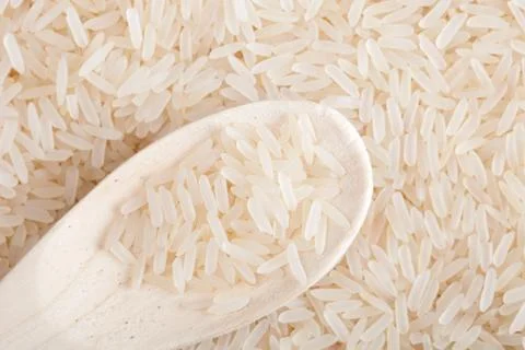 Spoon with rice Stock Photos