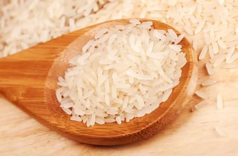 Spoon with rice Stock Photos