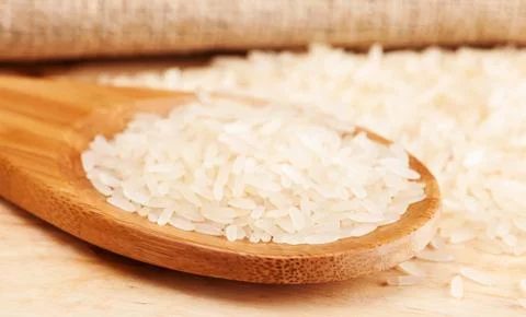 Spoon with rice Stock Photos