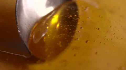 Spoon Scooping Honey Close-Up 2 Stock Footage 53028688