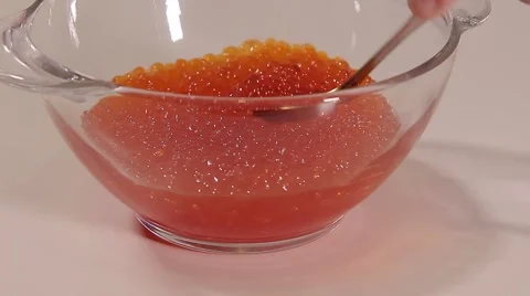 Spoon scoops caviar Stock Footage 68710557