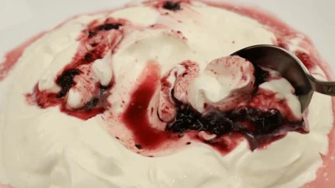 Spoon scoops sour cream with jam 스톡 동영상 188726645