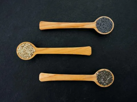 Spoon with seeds Stock Photos