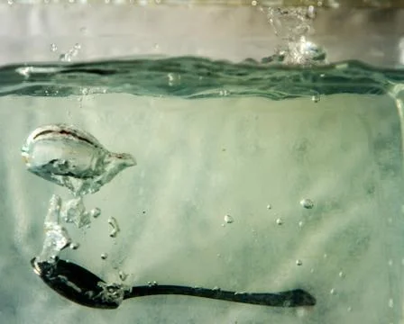 Spoon splash Stock Photos