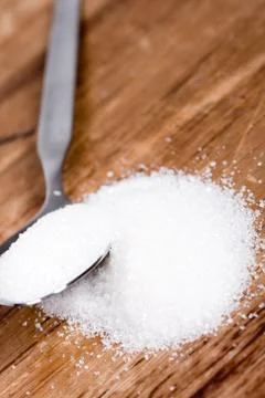 Spoon with sugar Stock Photos