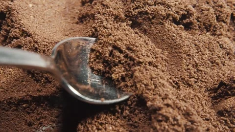 Spoon take freshly ground coffee. Brew smelling morning coffee Stock Footage 263925834