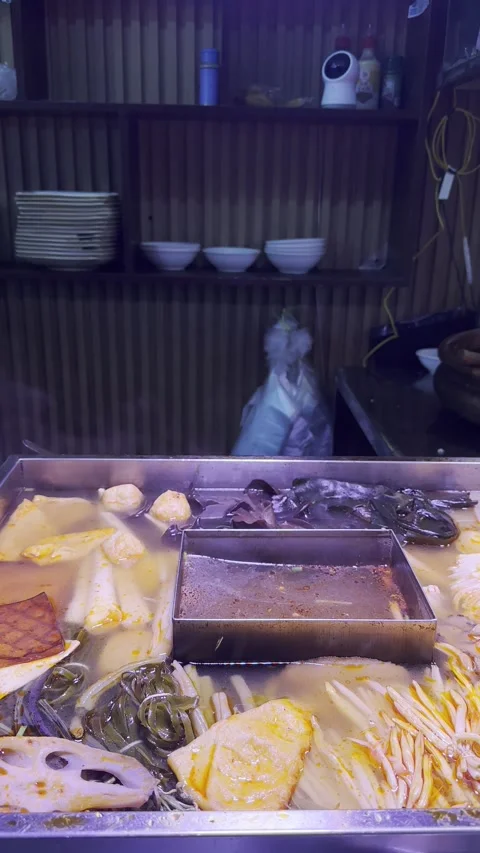 Spoon takes broth Stock Footage 316378084