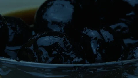 Spoon takes walnut jam Stock Footage 86308609