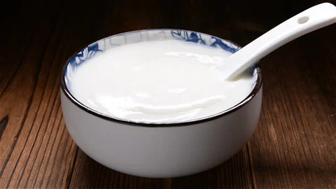 Spoon taking out almond paste Stock Footage 102196409