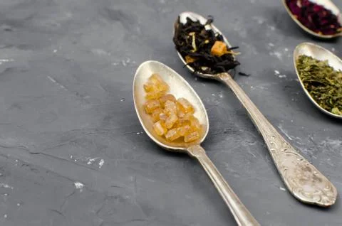 Spoon with tea on the table Stock-Fotos