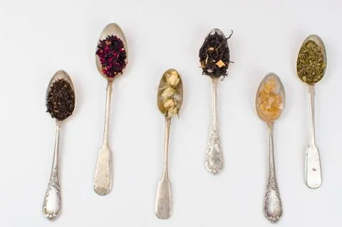 Spoon with tea on the table Stock Photos