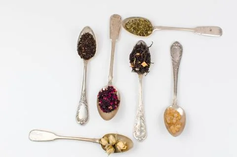 Spoon with tea on the table Stock Photos