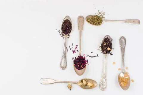 Spoon with tea on the table Stock Photos