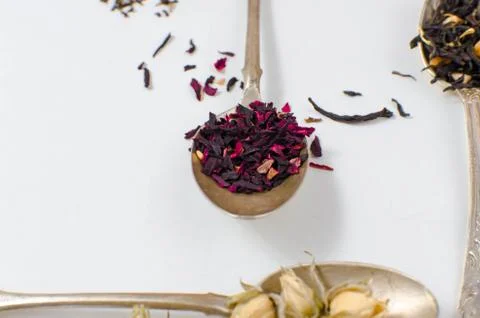 Spoon with tea on the table Stock Photos