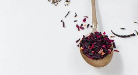 Spoon with tea on the table Stock Photos
