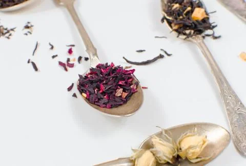 Spoon with tea on the table Stock Photos