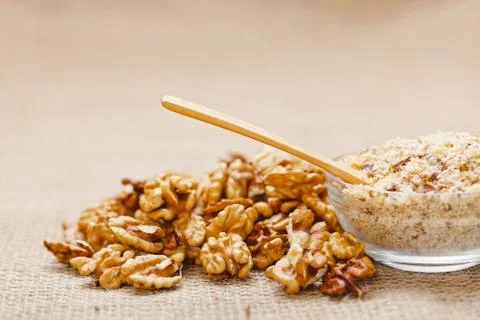Spoon in walnut ground Stock Photos