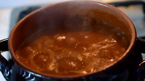 Spoonful in the sauce Stock Footage 129318224