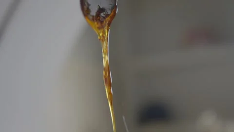 A spoonful of something is being scooped up by a person's hand Video stock 306042623