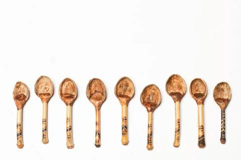 Spoons made with walnut shells on a white background Foto stock