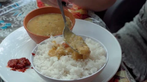 Spoons rice with vegetable sauce, close-up meal Video stock 224355072