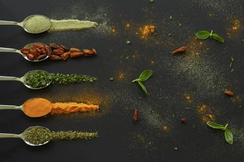 Spoons with spices Stock Photos
