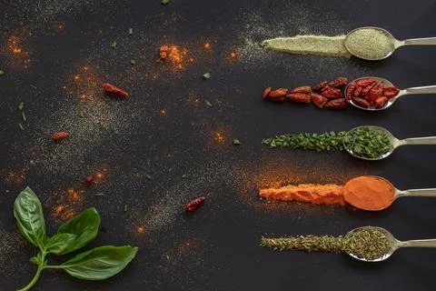 Spoons with spices Stock Photos
