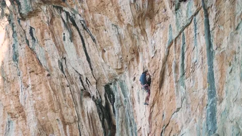 Sport climbing on a vertical mountain wall Video stock 167728099