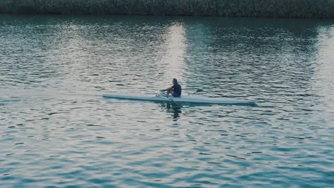 Sport dramatic, Canoeing in the city river, kayaking in Seville in very Stock Footage 142954479