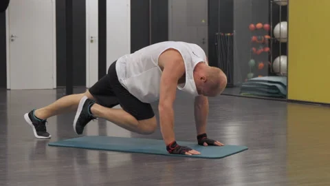 Sport man doing abs exercise workout at gym indoors. Fitness. Stock Footage 141986520