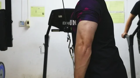 Sport man doing exercise Triceps Pushdown with cable at gym. Stock Footage 109039306