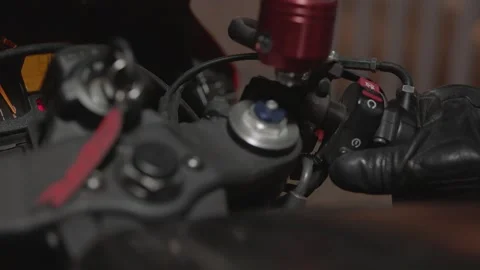 Sport Motorcycle dashboard with lights , speedometer close up , ignition on Stock Footage 219853142