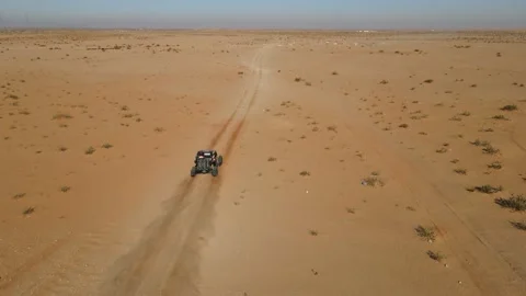 A sport prototype running the rally event in the desert Stock Footage 169274666