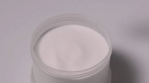Sport supplement, creatine, hmb, bcaa, amino acid or vitamin scoop with powder. Stock Footage 77728045