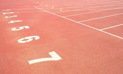 Sport track running with numbers on stadium Stock Photos
