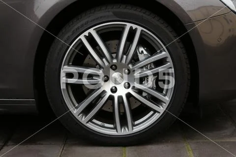 Sportcar aluminium wheel with tire Stock Photos