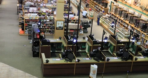 Sporting goods store gun and firearms department customers 4K Stock-Footage 103275080