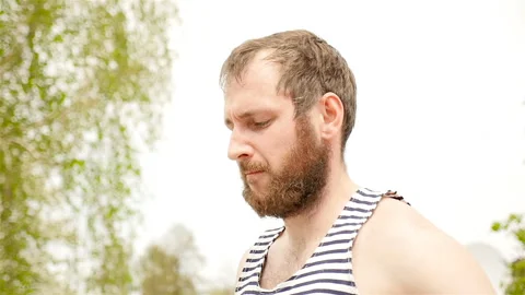 A sportive man is jumping rope. Delayed shooting. Close-up of a man Video stock 88885499