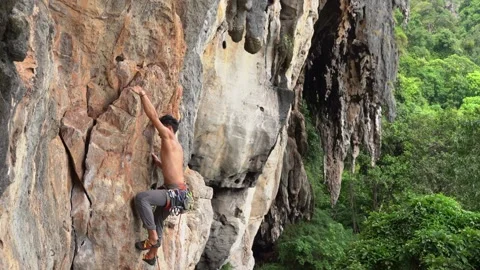 Sportive Man Training On Mountain Wall Stock Footage 146223206