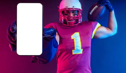 Sports Betting. American Football Player. Sports betting on futebol. Bets in the Stock Photos