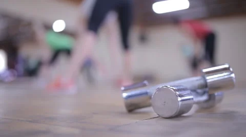 Sports complex group of people doing exercises , dumbbells closeup Stock Footage 61853273
