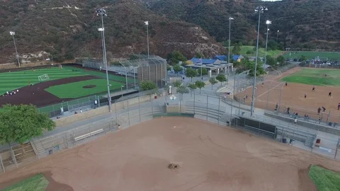 Sports Complex practice on a baseball field - Arial Shot Stock Footage 93911377