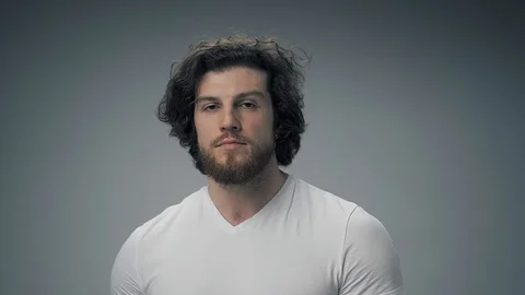 Sports model posing in studio on white Stock Footage 127801835