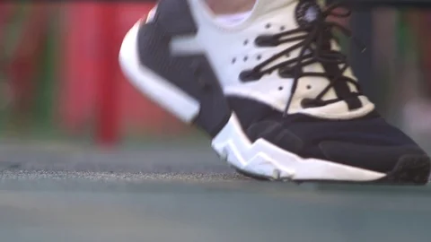  sports shoes close-up. runing slow motion camera Stock Footage