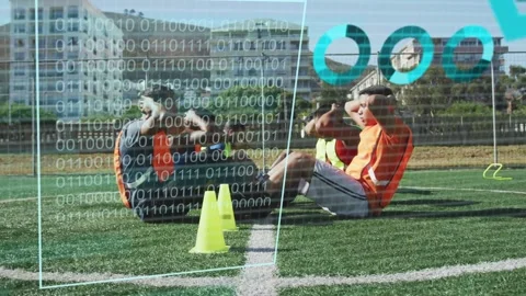 Sports team doing partnered sit-ups, starting reps for fitness while data Vidéo 333510568